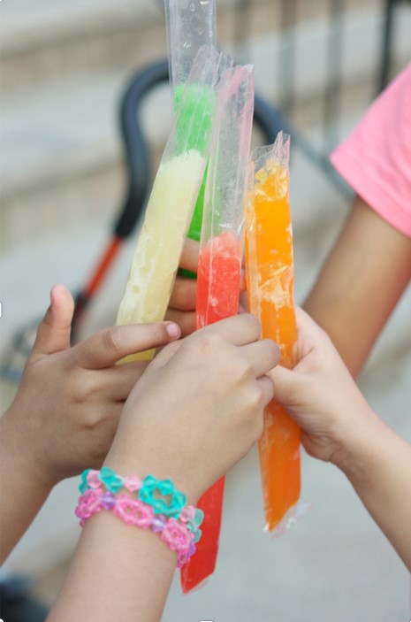 kids holding lollies